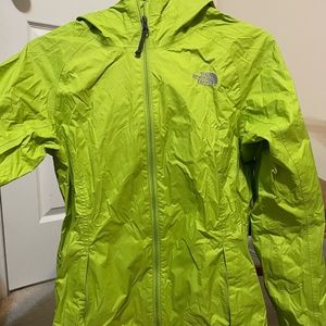 The North Face green windbreaker
